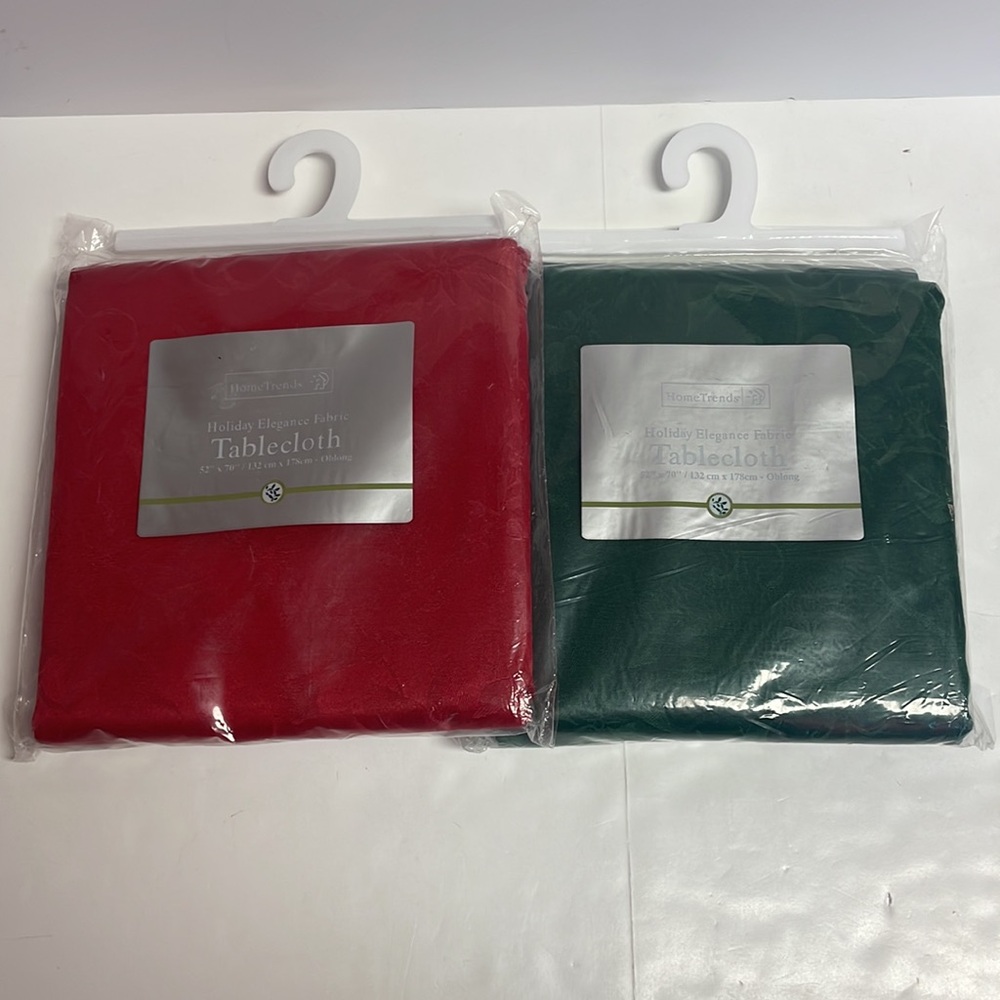 NIP HomeTrends tablecloths 1 red 1 green 52’x70’